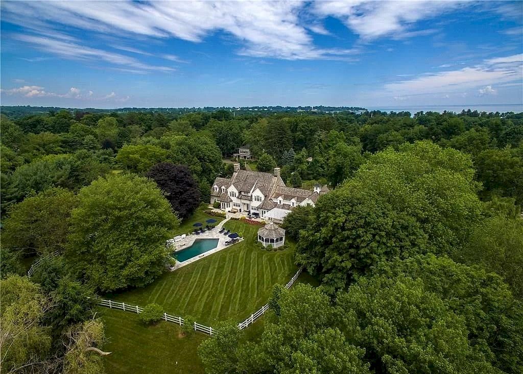 The Home in Connecticut is a luxurious resort-style vacation retreat now available for sale. This home located at 345 Greens Farms Rd, Westport, Connecticut; offering 07 bedrooms and 08 bathrooms with 10,531 square feet of living spaces.