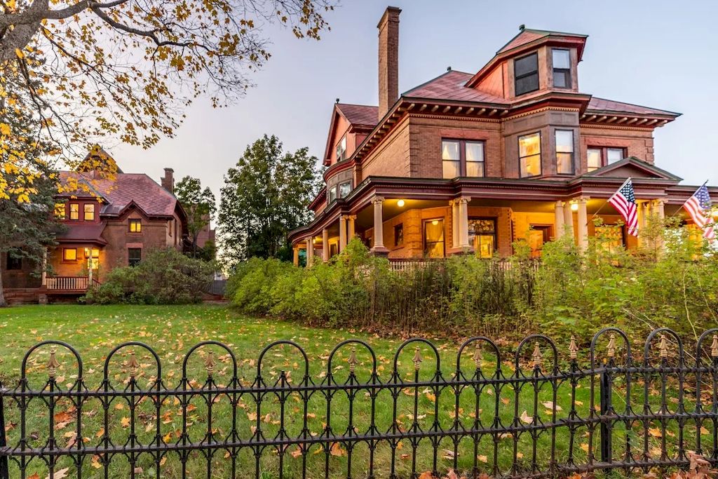 The Home in Michigan is a luxurious home currently being operated as a turn-key bed & breakfast vacation retreat now available for sale. This home located at 320 Tamarack St, Laurium, Michigan; offering 36 bedrooms and 11 bathrooms with 37,880 square feet of living spaces.