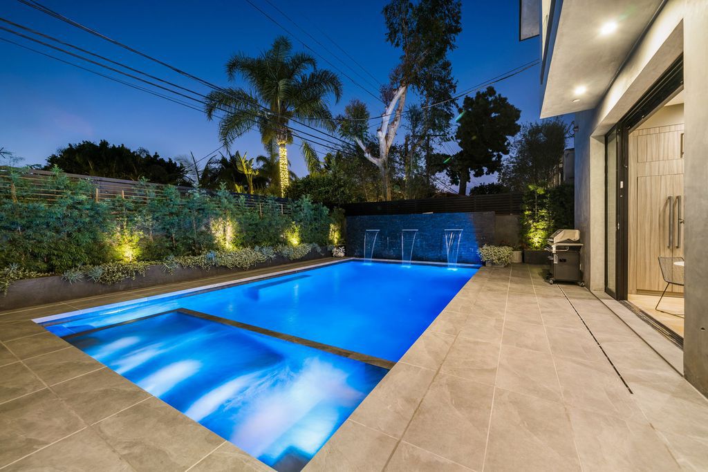 The Home in West Hollywood is an architectural gated masterpiece has entertainer’s backyard showcases heated Zero edge pool and over-sized spa now available for sale. This home located at 813 N Laurel Ave, Los Angeles, California