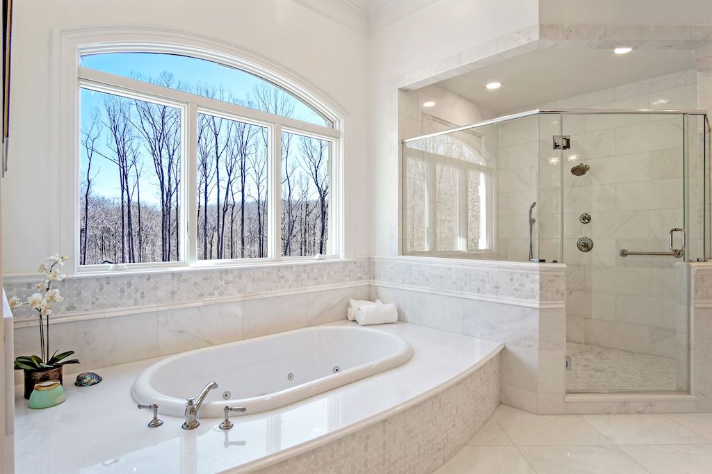 The Home in Virginia is a luxurious home surrounded by picturesque wooded parkland and lush greenery now available for sale. This home located at 119 Clarks Run Rd, Great Falls, Virginia; offering 06 bedrooms and 08 bathrooms with 13,000 square feet of living spaces.