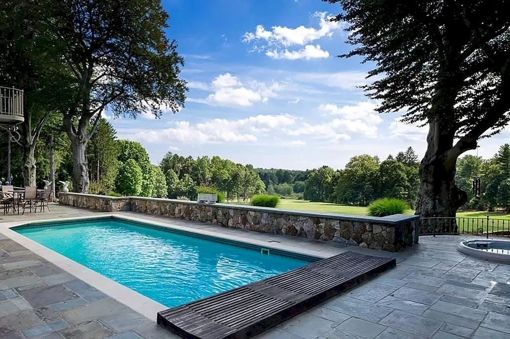 The Home in Massachusetts is a luxurious home situated in a private setting now available for sale. This home located at 59 Walnut Rd, Wenham, Massachusetts; offering 06 bedrooms and 05 bathrooms with 7,760 square feet of living spaces.