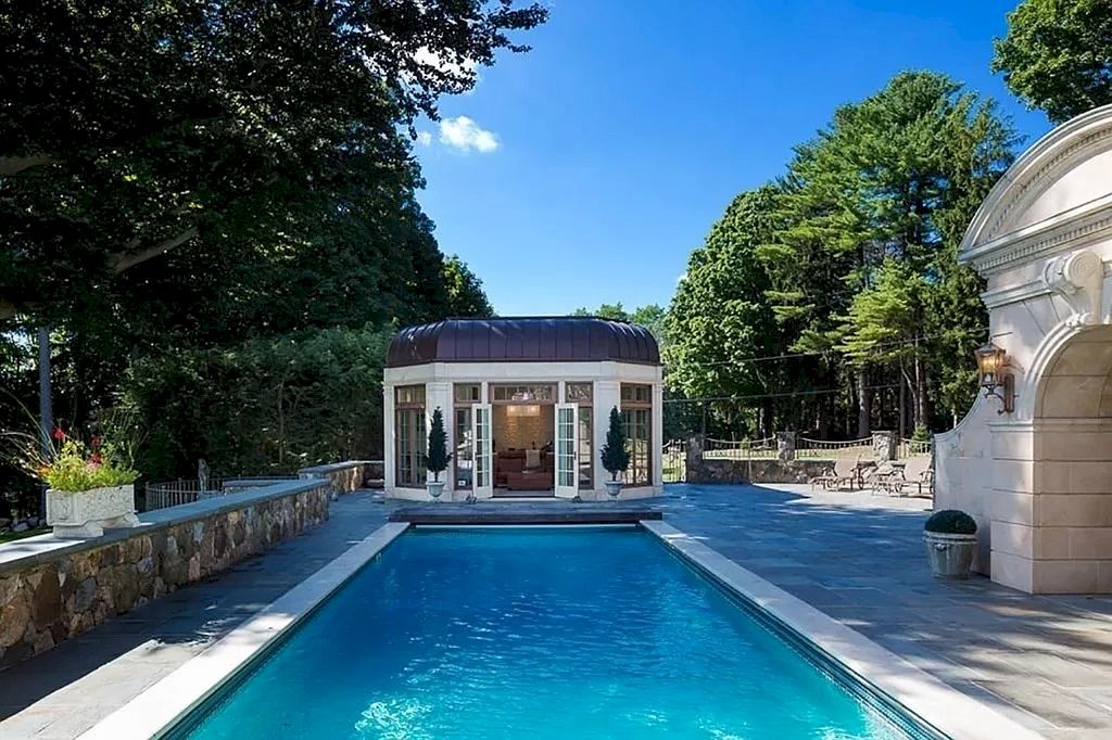 The Home in Massachusetts is a luxurious home situated in a private setting now available for sale. This home located at 59 Walnut Rd, Wenham, Massachusetts; offering 06 bedrooms and 05 bathrooms with 7,760 square feet of living spaces.