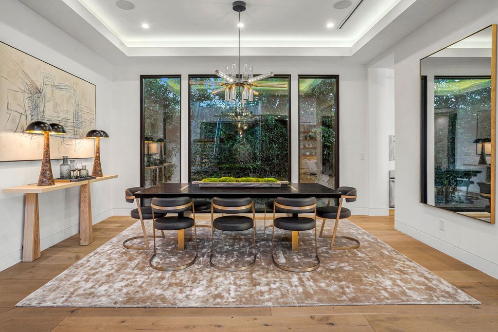The Home in Los Angeles is an immaculately done 2018 modern residence located south of Melrose Avenue in LA's lively Fairfax District now available for sale. This home located at 445 N Fuller Ave, Los Angeles, California