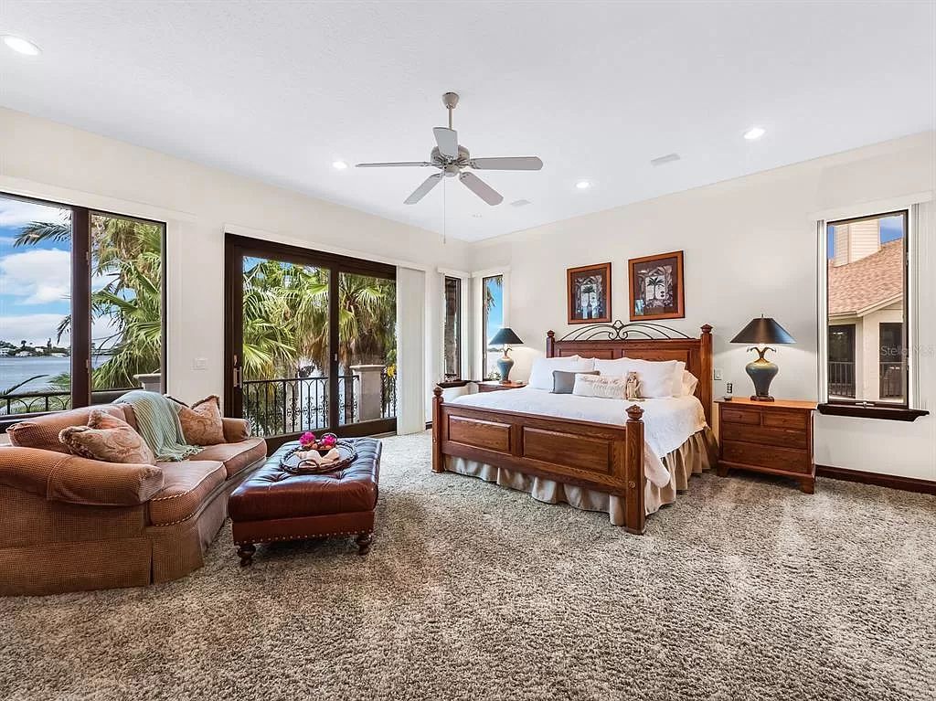 The Florida Home is perfectly perched on two lots overlooking Anna Maria Sound with expansive water and sunset views throughout now available for sale. This home located at 12925 42nd Ter W, Cortez, Florida