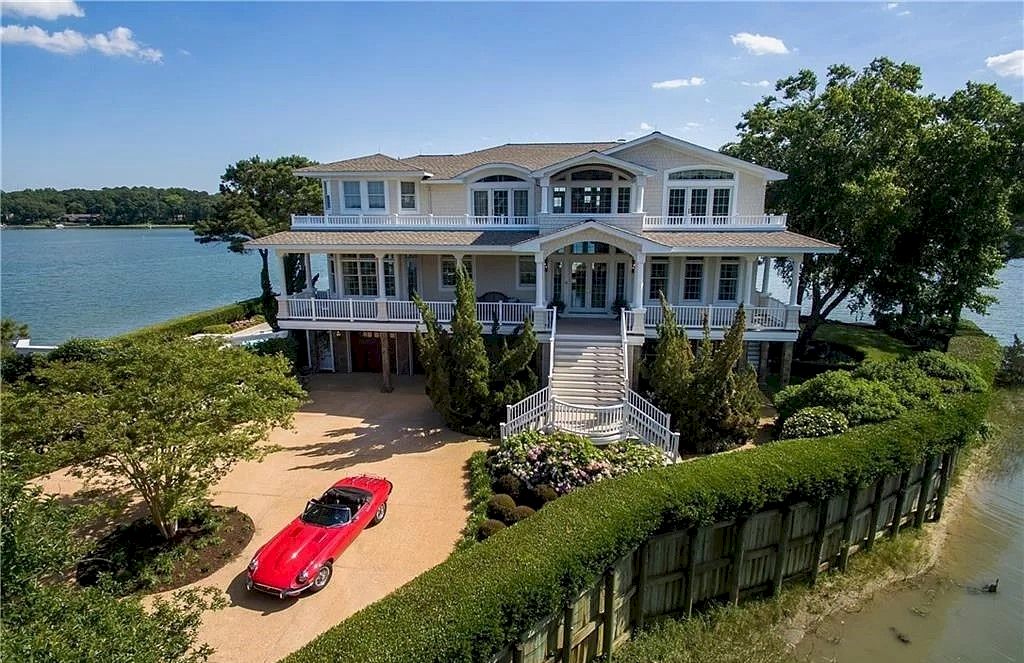 The Home in Virginia is a luxurious home offering beautiful deep water views now available for sale. This home located at 1601 Spring House Trl, Virginia Beach, Virginia; offering 05 bedrooms and 08 bathrooms with 6,406 square feet of living spaces.