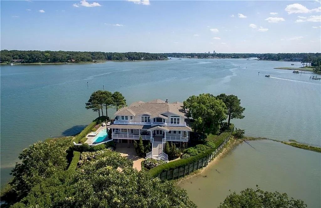 The Home in Virginia is a luxurious home offering beautiful deep water views now available for sale. This home located at 1601 Spring House Trl, Virginia Beach, Virginia; offering 05 bedrooms and 08 bathrooms with 6,406 square feet of living spaces.