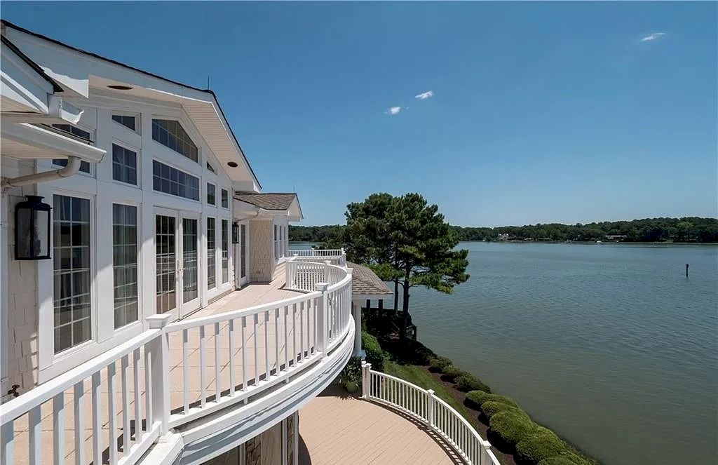 The Home in Virginia is a luxurious home offering beautiful deep water views now available for sale. This home located at 1601 Spring House Trl, Virginia Beach, Virginia; offering 05 bedrooms and 08 bathrooms with 6,406 square feet of living spaces.