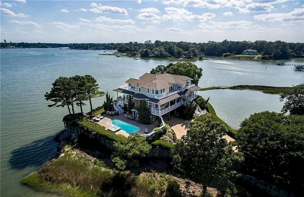 The Home in Virginia is a luxurious home offering beautiful deep water views now available for sale. This home located at 1601 Spring House Trl, Virginia Beach, Virginia; offering 05 bedrooms and 08 bathrooms with 6,406 square feet of living spaces.