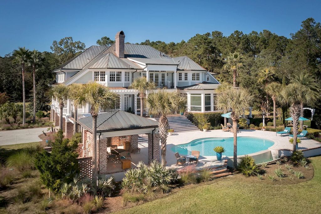 The Home in South Carolina is a luxurious home featuring the finest architecture and endless edge saltwater pool now available for sale. This home located at 4458 Park Island Rd, Meggett, South Carolina; offering 05 bedrooms and 08 bathrooms with 12,776 square feet of living spaces.