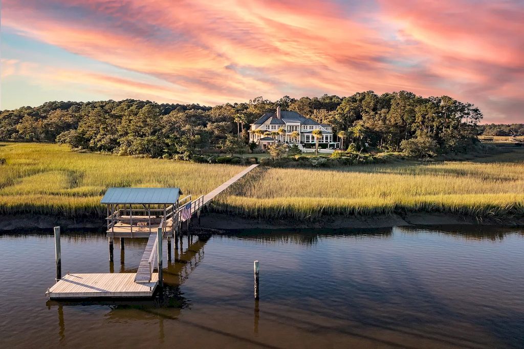 The Home in South Carolina is a luxurious home featuring the finest architecture and endless edge saltwater pool now available for sale. This home located at 4458 Park Island Rd, Meggett, South Carolina; offering 05 bedrooms and 08 bathrooms with 12,776 square feet of living spaces.