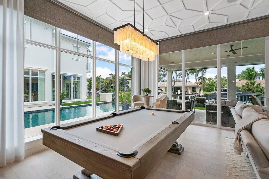 The Home in Boca Raton is a luxurious waterfront estate in exclusive community perfect for boating enthusiasts now available for sale. This home located at 731 Marble Way, Boca Raton, Florida