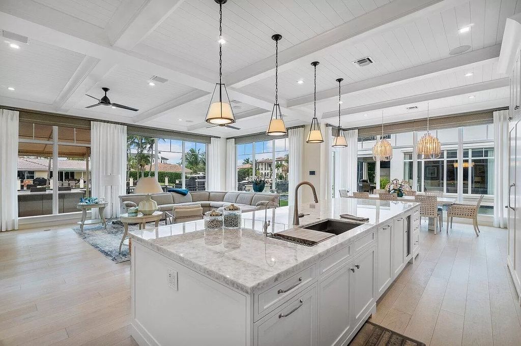 The Home in Boca Raton is a luxurious waterfront estate in exclusive community perfect for boating enthusiasts now available for sale. This home located at 731 Marble Way, Boca Raton, Florida