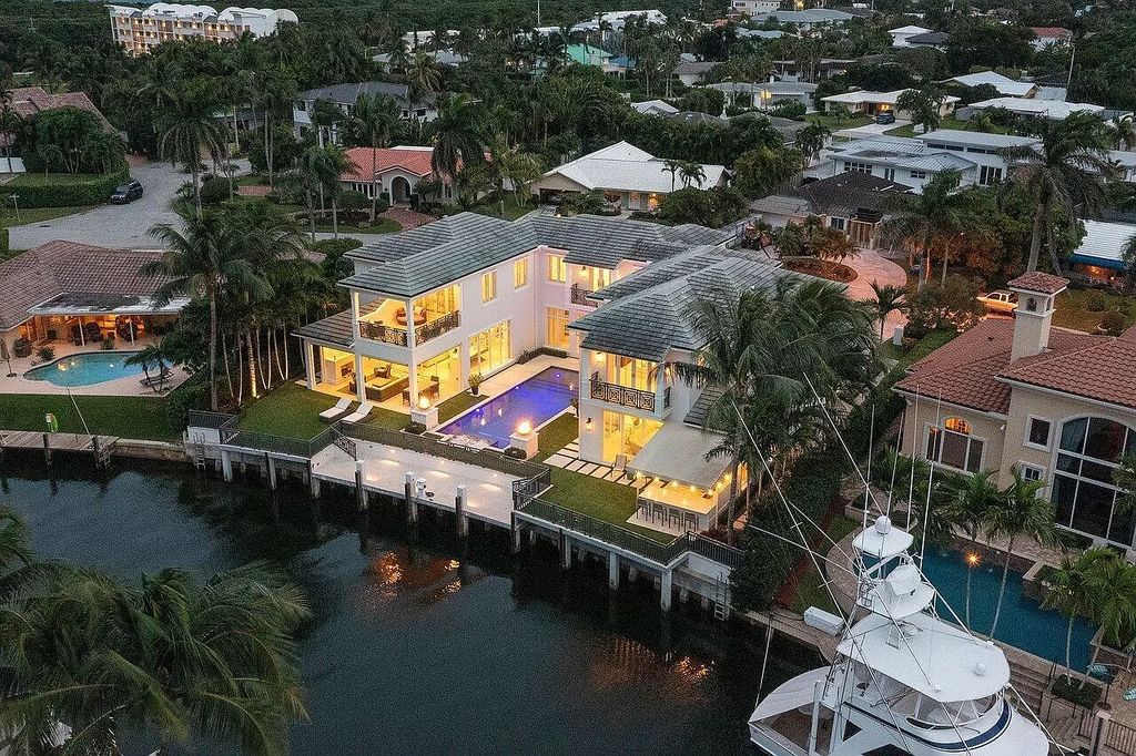 The Home in Boca Raton is a luxurious waterfront estate in exclusive community perfect for boating enthusiasts now available for sale. This home located at 731 Marble Way, Boca Raton, Florida