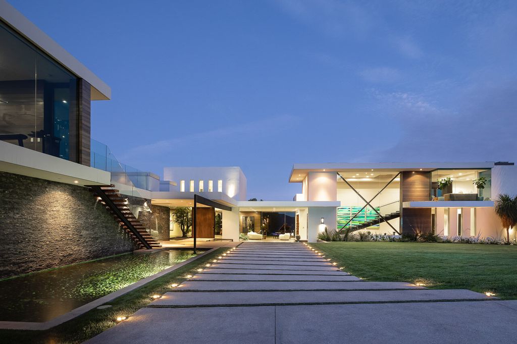 The Mansion in Beverly Hills is a one of a kind contemporary compound sits on a promontory with 270 degree views now available for sale. This home located at 3000 Benedict Canyon Dr, Beverly Hills, California