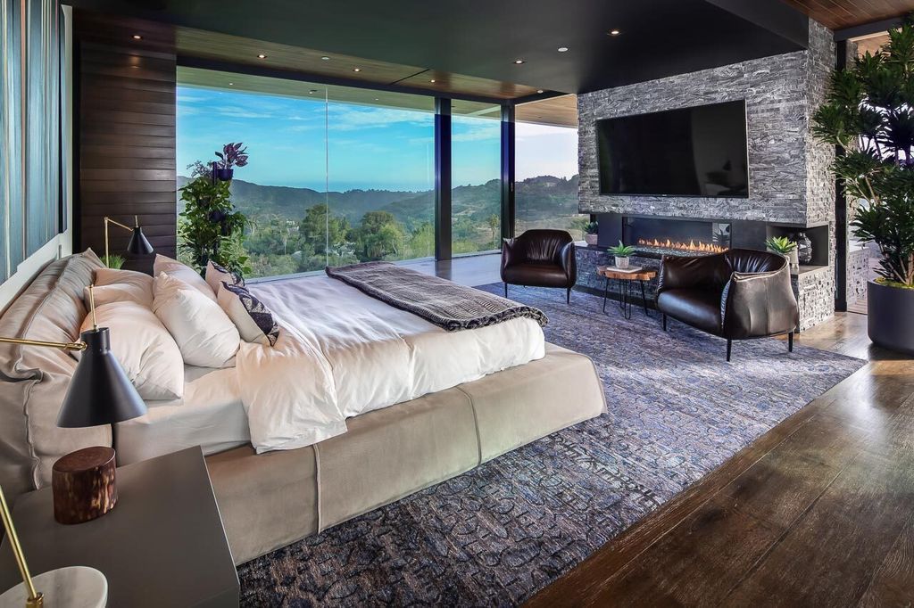 The Mansion in Beverly Hills is a one of a kind contemporary compound sits on a promontory with 270 degree views now available for sale. This home located at 3000 Benedict Canyon Dr, Beverly Hills, California