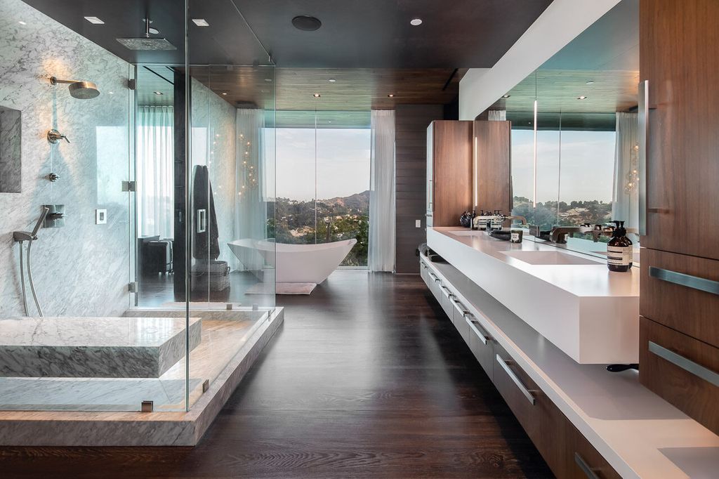 The Mansion in Beverly Hills is a one of a kind contemporary compound sits on a promontory with 270 degree views now available for sale. This home located at 3000 Benedict Canyon Dr, Beverly Hills, California