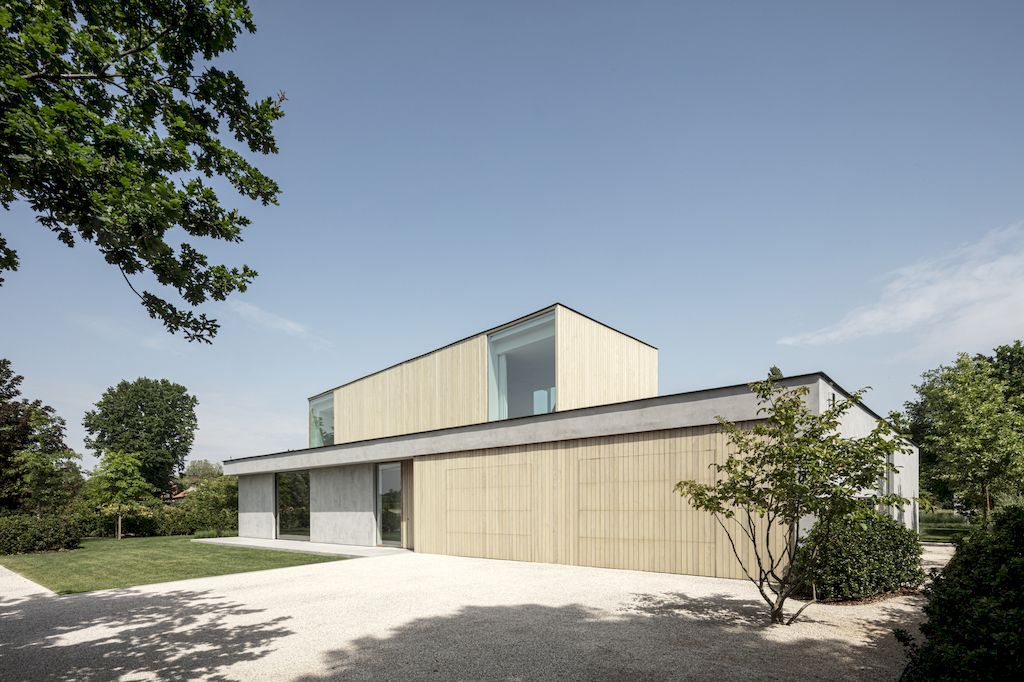 Villa Bonh, an U-shaped home in contemporary fashion by CAS architecten