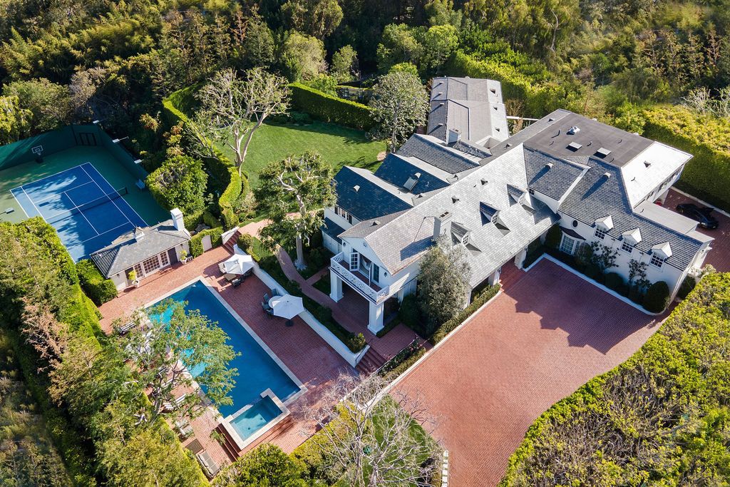 The Mansion in Los Angeles is a completely renovated Paul Williams traditional on an acre of magnificent lawns and gardens now available for sale. This home located at 111 N Mapleton Dr, Los Angeles, California