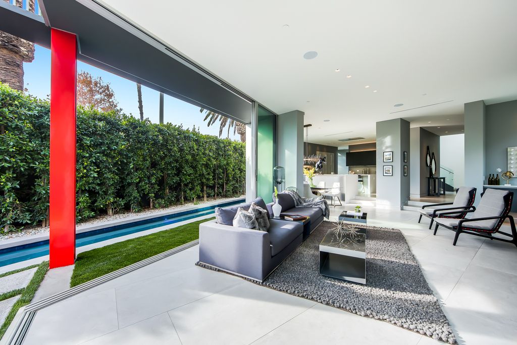 The Home in West Hollywood is a modern oasis masterfully balances cool contemporary design with lush greenery now available for sale. This house located at 417 Norwich Dr, West Hollywood, California