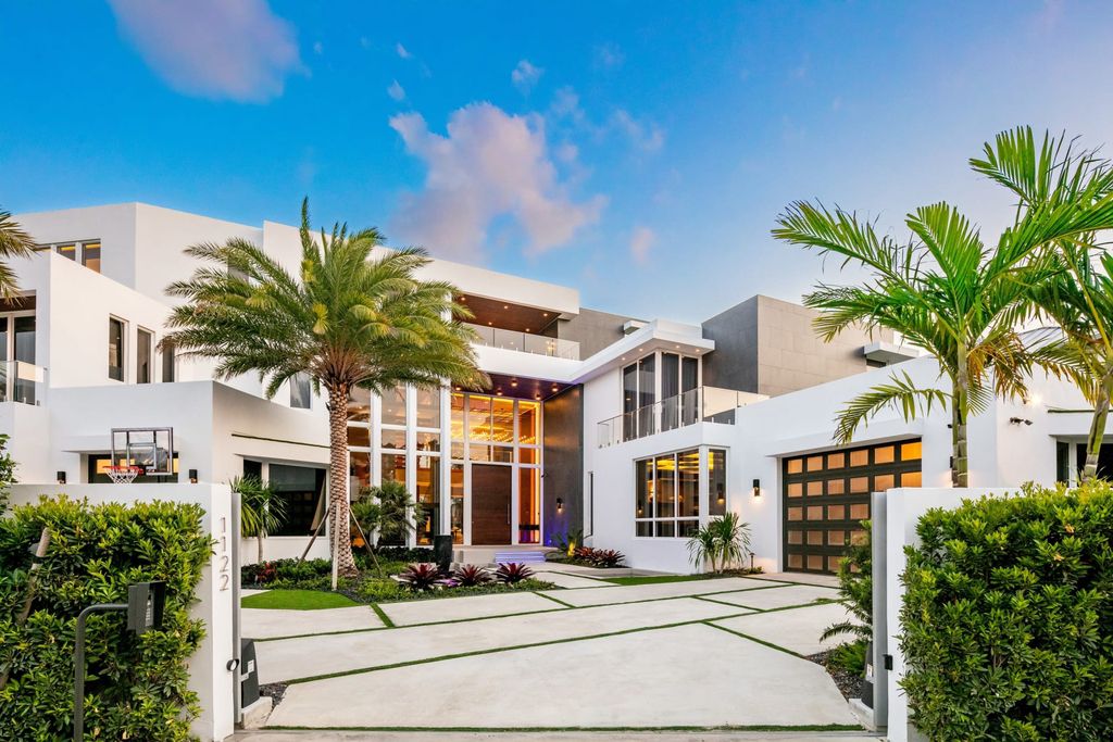 The Mansion in Fort Lauderdale is a Breathtaking one-of-a-kind estate offers fastidious craftsmanship and attention to detail with ultra high-end finishes throughout now available for sale. This home located at 1122 SE 4th St, Fort Lauderdale, Florida