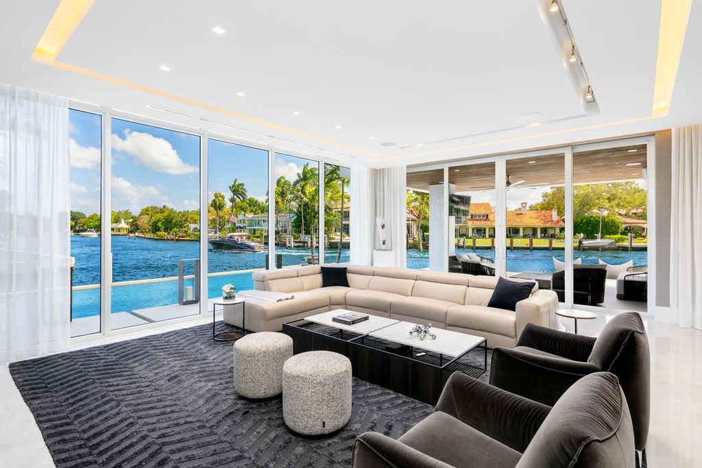 The Mansion in Fort Lauderdale is a Breathtaking one-of-a-kind estate offers fastidious craftsmanship and attention to detail with ultra high-end finishes throughout now available for sale. This home located at 1122 SE 4th St, Fort Lauderdale, Florida