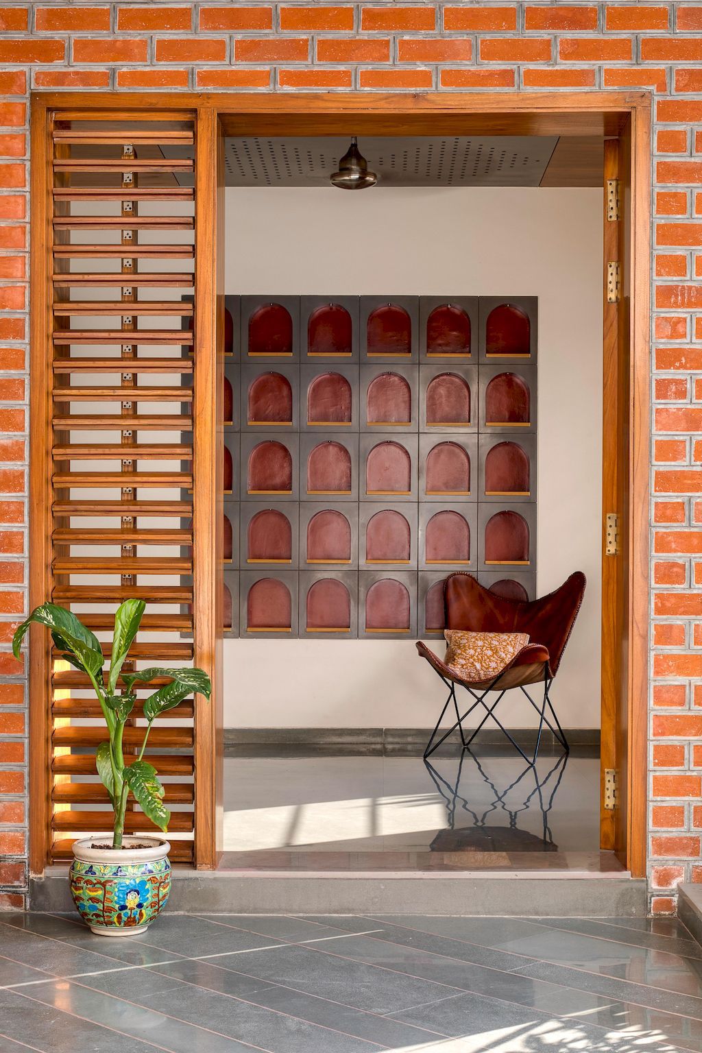 Brick Screen house in charm traditional style in India by MS Design Studio