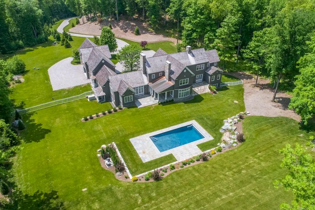 The Home in Connecticut is a luxurious home with elegant and comfortable spaces throughout and energy efficiency now available for sale. This home located at 40/42 Nettleton Hollow Rd, Washington, Connecticut; offering 05 bedrooms and 08 bathrooms with 11,776 square feet of living spaces.