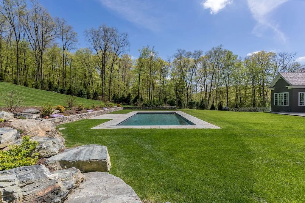 The Home in Connecticut is a luxurious home with elegant and comfortable spaces throughout and energy efficiency now available for sale. This home located at 40/42 Nettleton Hollow Rd, Washington, Connecticut; offering 05 bedrooms and 08 bathrooms with 11,776 square feet of living spaces.