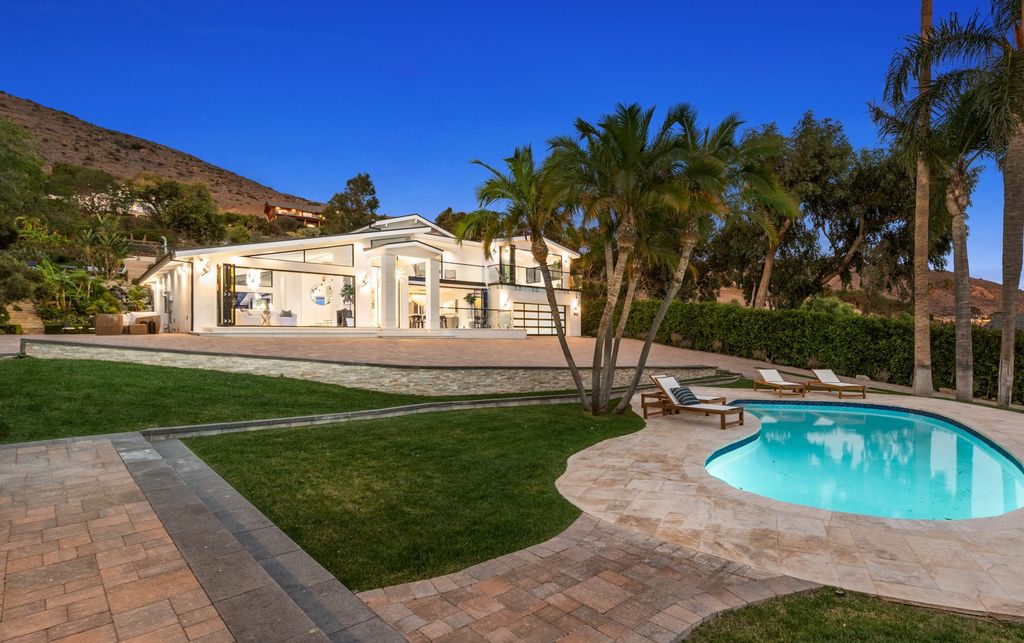 The Home in Malibu is a newly rebuilt contemporary oasis with top of the line finishes imported from around the globe now available for sale. This home located at 31223 Bailard Rd, Malibu, California