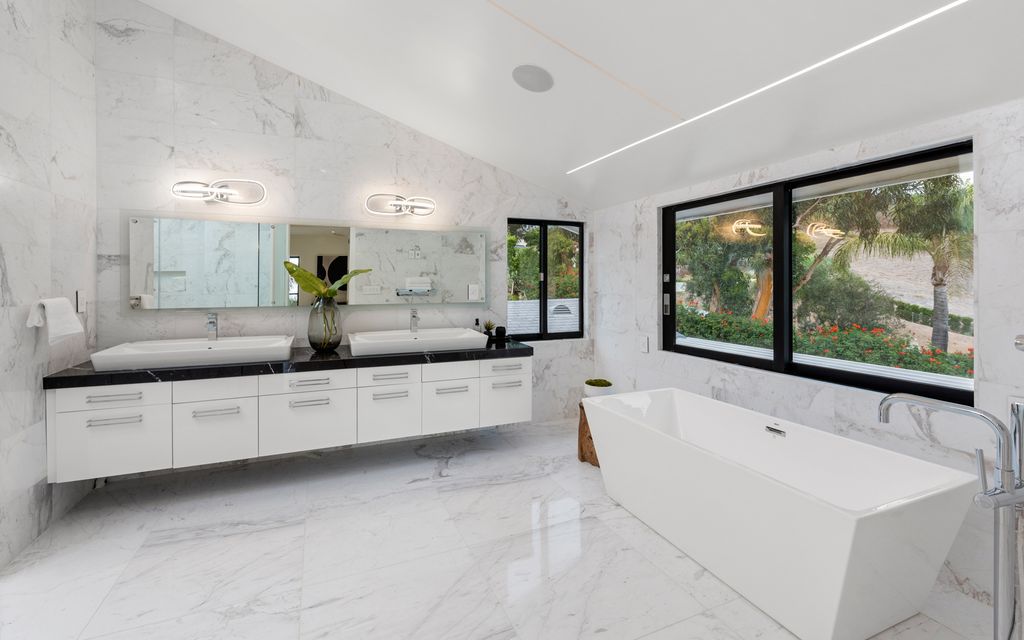 The Home in Malibu is a newly rebuilt contemporary oasis with top of the line finishes imported from around the globe now available for sale. This home located at 31223 Bailard Rd, Malibu, California