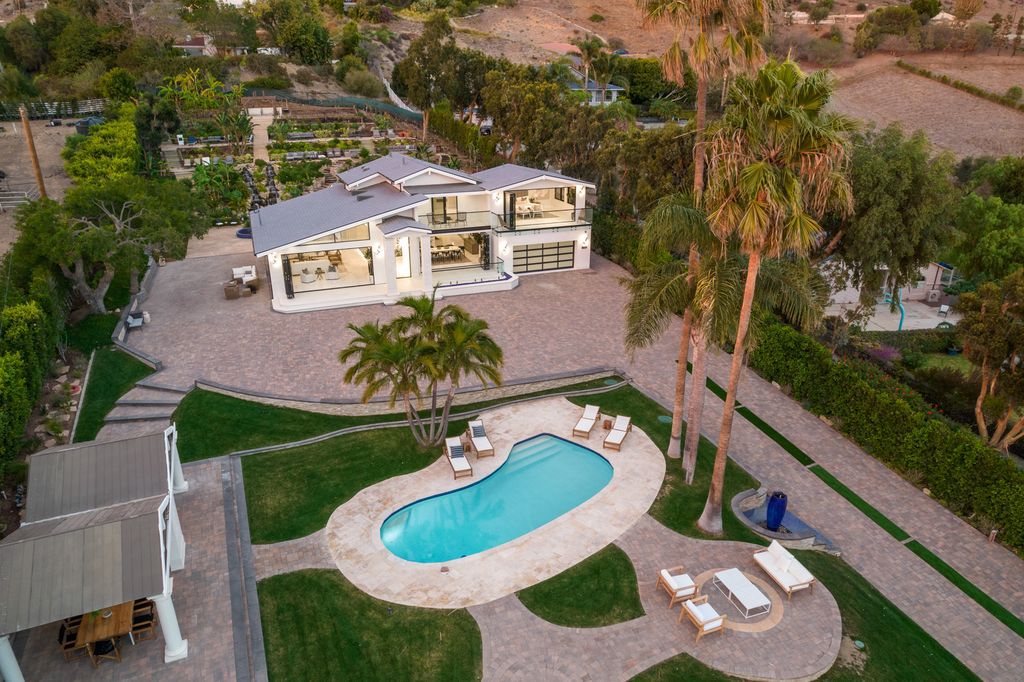 The Home in Malibu is a newly rebuilt contemporary oasis with top of the line finishes imported from around the globe now available for sale. This home located at 31223 Bailard Rd, Malibu, California