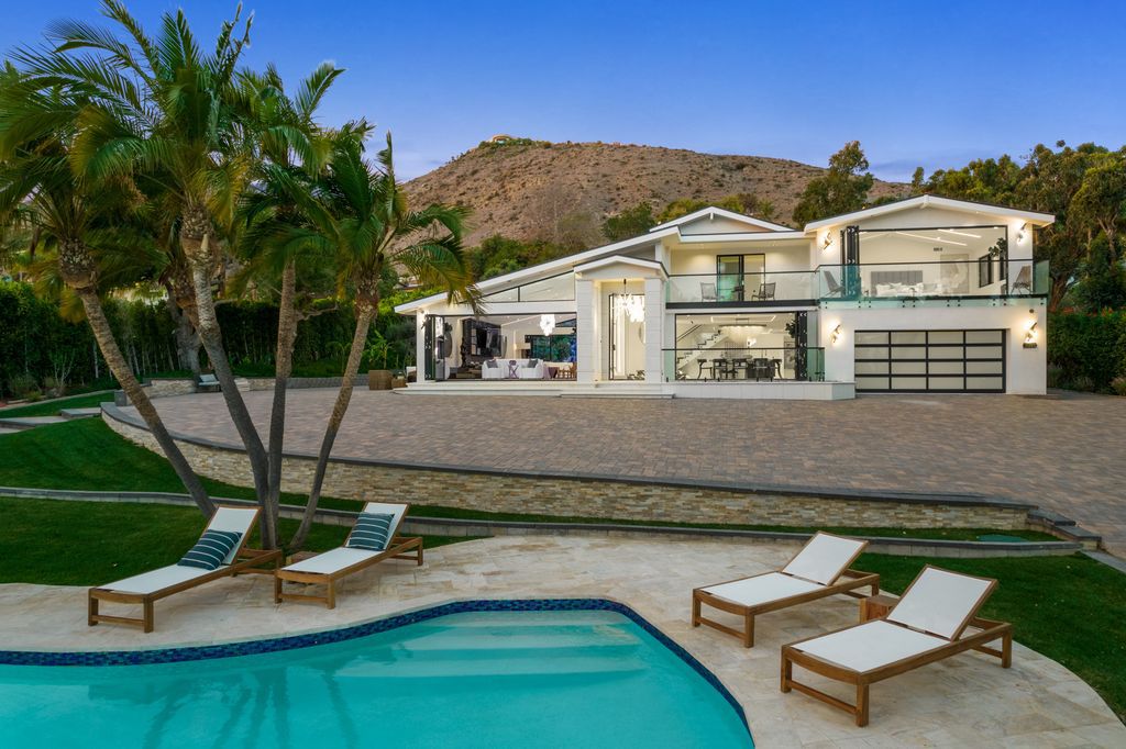The Home in Malibu is a newly rebuilt contemporary oasis with top of the line finishes imported from around the globe now available for sale. This home located at 31223 Bailard Rd, Malibu, California