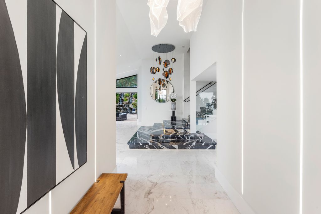 The Home in Malibu is a newly rebuilt contemporary oasis with top of the line finishes imported from around the globe now available for sale. This home located at 31223 Bailard Rd, Malibu, California