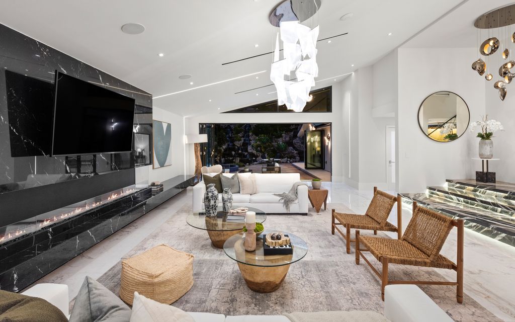 The Home in Malibu is a newly rebuilt contemporary oasis with top of the line finishes imported from around the globe now available for sale. This home located at 31223 Bailard Rd, Malibu, California