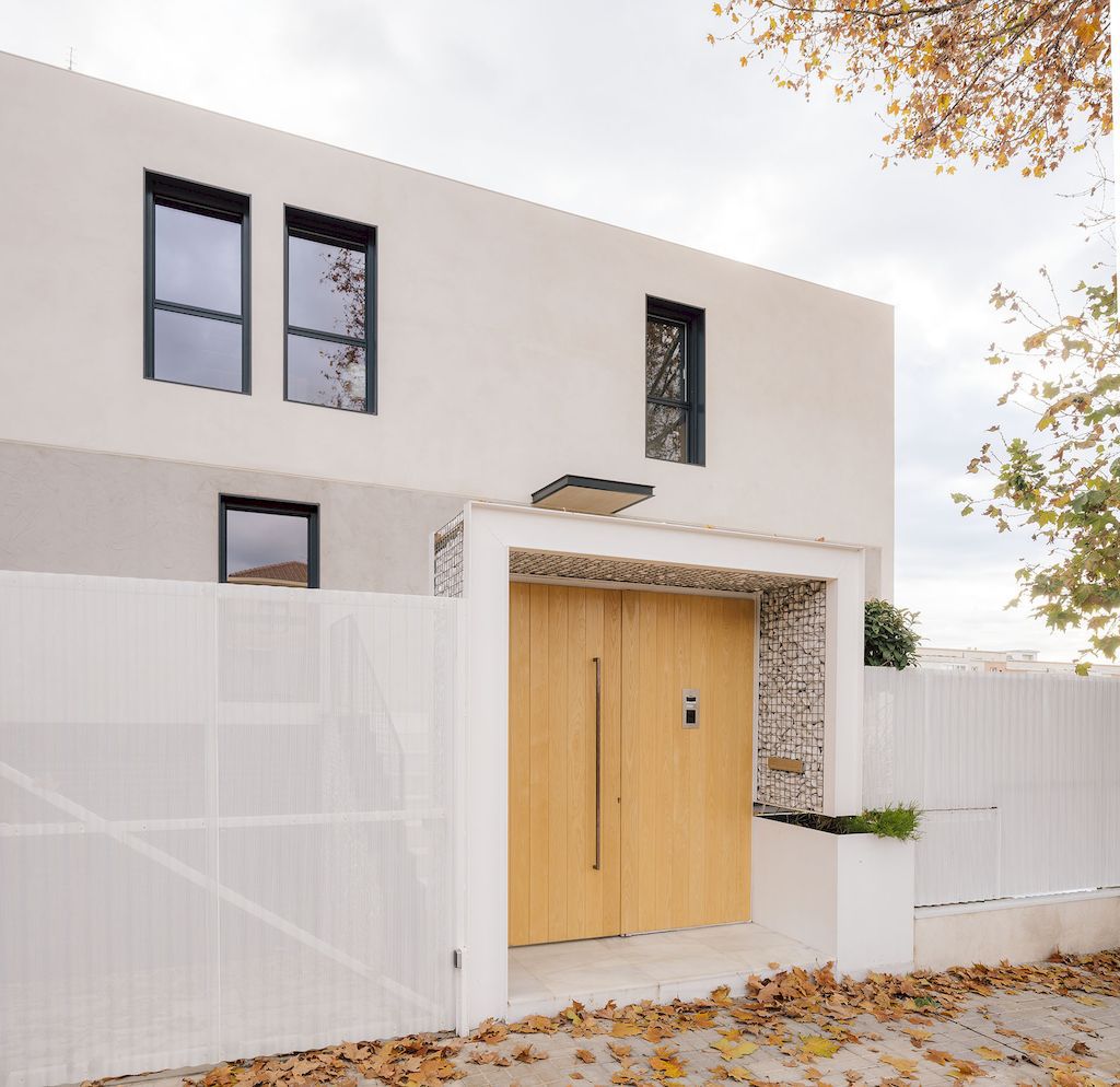 PMC House, an Elegant Three-story Home in Spain by EXarchitects