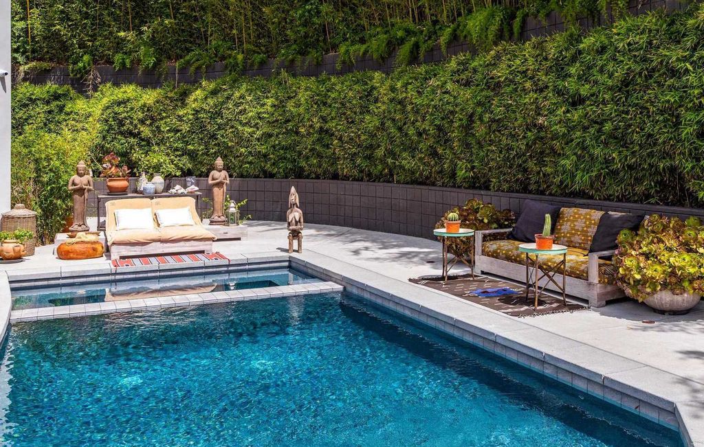 The Home in Los Angeles is a Holmby Hills hidden oasis nestled behind bamboo hedges and secluded from the street now available for sale. This house located at 1140 Brooklawn Dr, Los Angeles, California