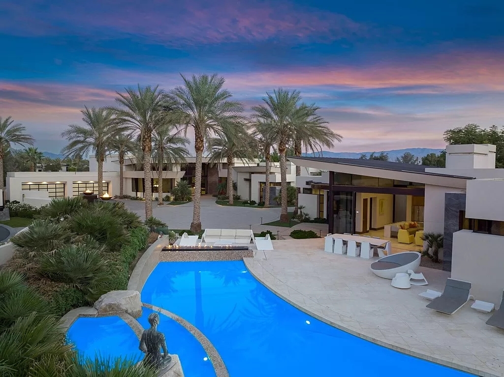 The Home in La Quinta is a sprawling family compound located behind the gates of The Madison Club now available for sale. This home located at 81150 Ellsworth Pl, La Quinta, California