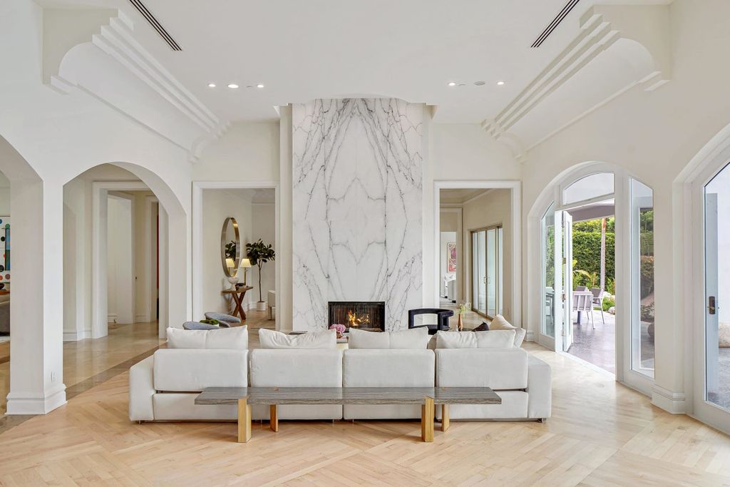 The Beverly Hills Home is a completely private and gated sanctuary was impeccably designed to frame the awe-inspiring city of Los Angeles now available for sale. This house located at 419 Robert Ln, Beverly Hills, California