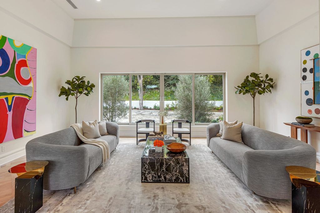 The Beverly Hills Home is a completely private and gated sanctuary was impeccably designed to frame the awe-inspiring city of Los Angeles now available for sale. This house located at 419 Robert Ln, Beverly Hills, California