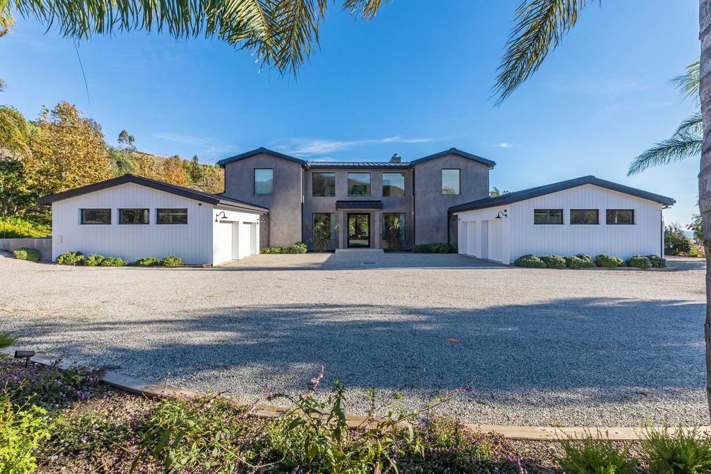 The Malibu Farmhouse is an expansive property encompasses 16.2 acres that showcase magnificent ocean and canyon views now available for sale. This home located at 6156 Ramirez Canyon Rd, Malibu, California; offering 7 bedrooms and 9 bathrooms with over 11,000 square feet of living spaces.