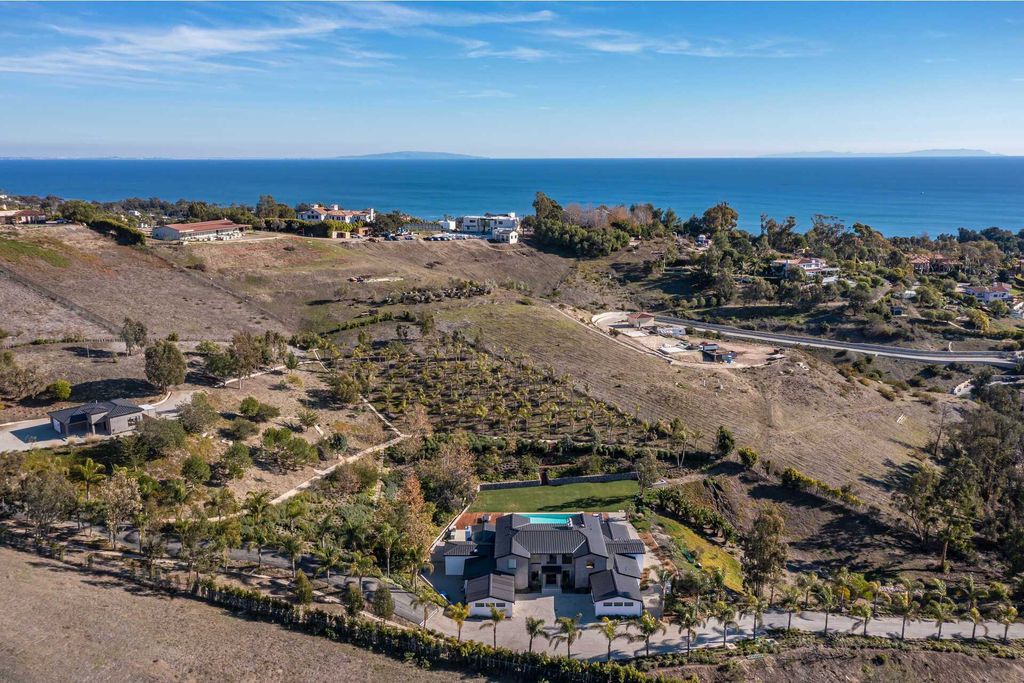 The Malibu Farmhouse is an expansive property encompasses 16.2 acres that showcase magnificent ocean and canyon views now available for sale. This home located at 6156 Ramirez Canyon Rd, Malibu, California; offering 7 bedrooms and 9 bathrooms with over 11,000 square feet of living spaces.