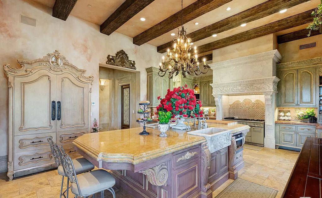 The Villa in Calabasas is an Italianate tour-de-force masterpiece set atop its own promontory ridge with 1.28 usable acres now available for sale. This home located at 25305 Prado De La Felicidad, Calabasas, California