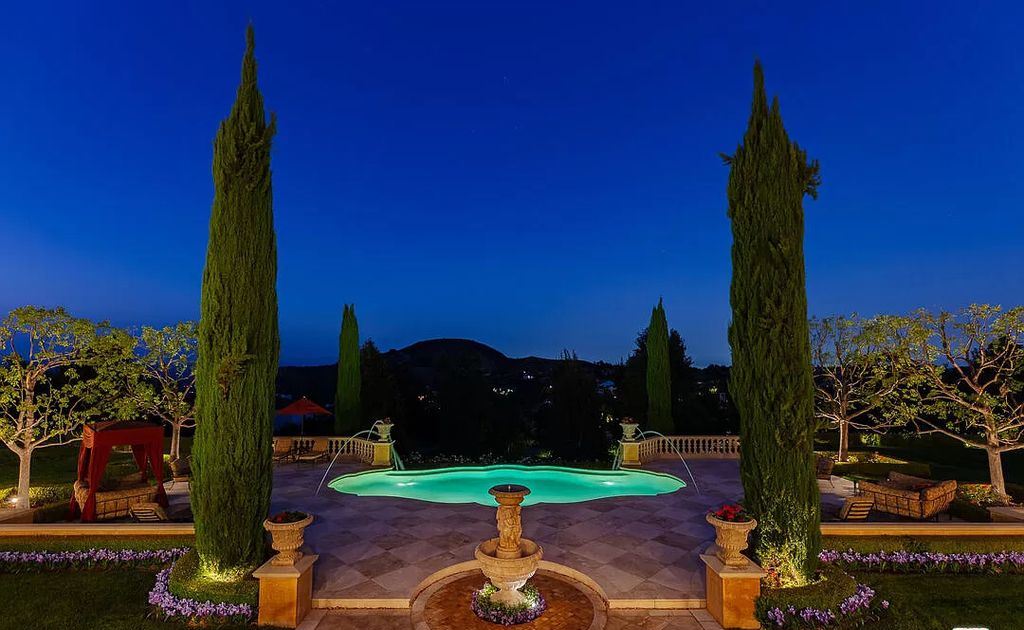 The Villa in Calabasas is an Italianate tour-de-force masterpiece set atop its own promontory ridge with 1.28 usable acres now available for sale. This home located at 25305 Prado De La Felicidad, Calabasas, California