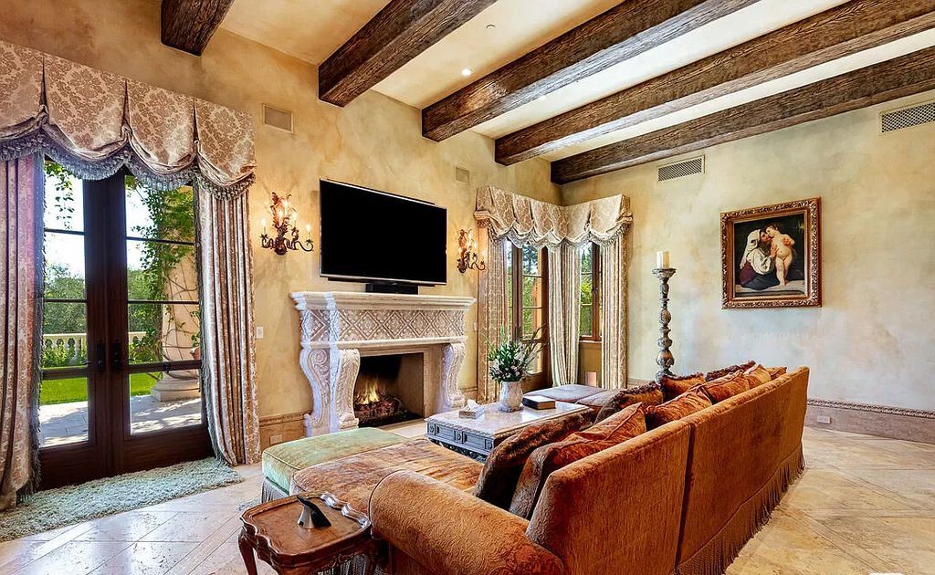 The Villa in Calabasas is an Italianate tour-de-force masterpiece set atop its own promontory ridge with 1.28 usable acres now available for sale. This home located at 25305 Prado De La Felicidad, Calabasas, California