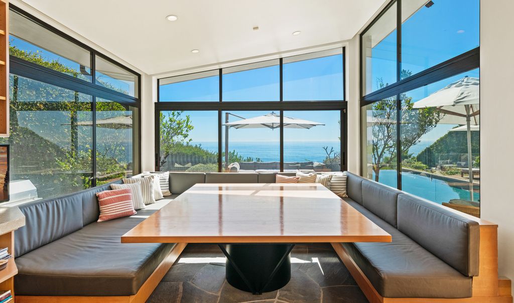 The Malibu Home is a Point Dume mid-century modern estate commands spectacular ocean and Catalina Island views now available for sale. This home located at 29060 Cliffside Dr, Malibu, California