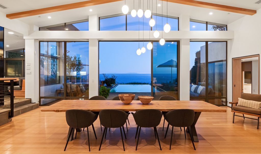 The Malibu Home is a Point Dume mid-century modern estate commands spectacular ocean and Catalina Island views now available for sale. This home located at 29060 Cliffside Dr, Malibu, California