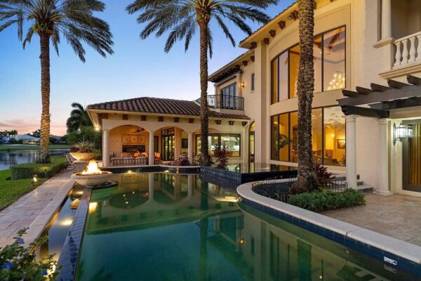 This Custom Home in Boca Raton with An Oversized Infinity Pool and ...