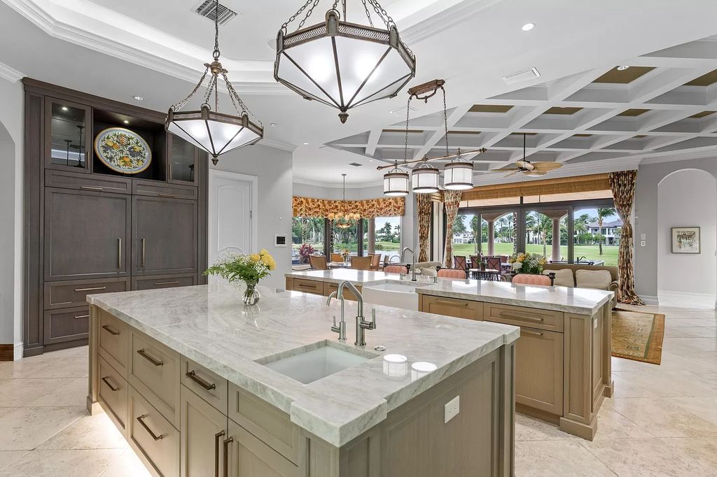 The Home in Boca Raton is a custom estate located in the prestigious St. Andrews Country Club now available for sale. This house located at 17045 Brookwood Dr, Boca Raton, Florida