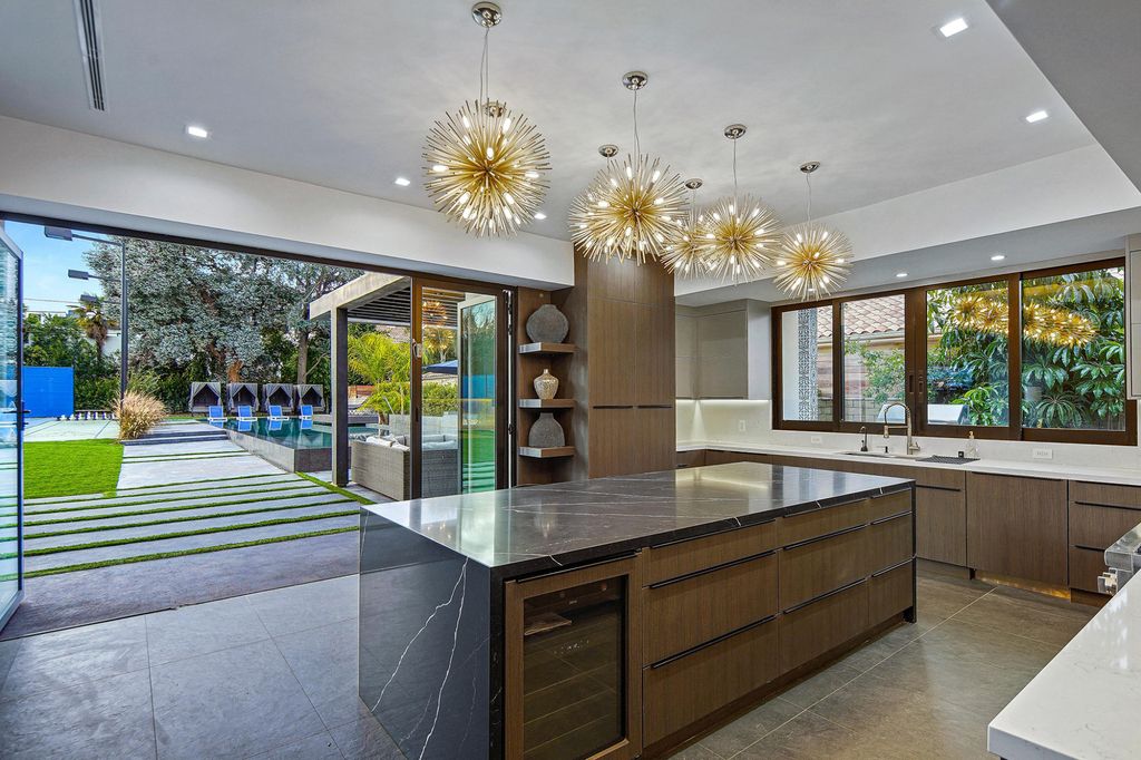 The Home in Encino is a luxurious contemporary estate designed by Alon Zakoot and located in highly coveted Amestoy Estates now available for sale. This home located at 5415 Amestoy Ave, Encino, California