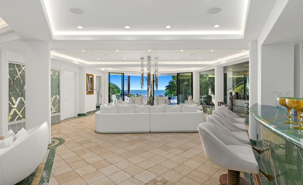 The Villa in Malibu is a remarkable architectural estate commands gorgeous ocean views from an ultra-private bluff above Paradise Cove now available for sale. This home located at 27930 Pacific Coast Hwy, Malibu, California